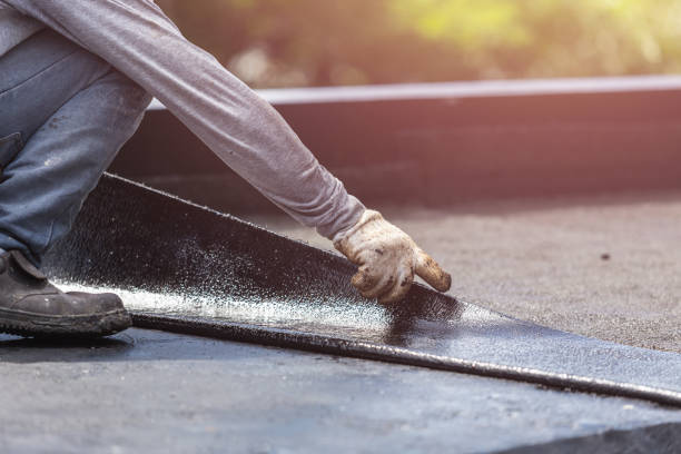 Professional Exterior Waterproofing technician working in Alexandria, AL